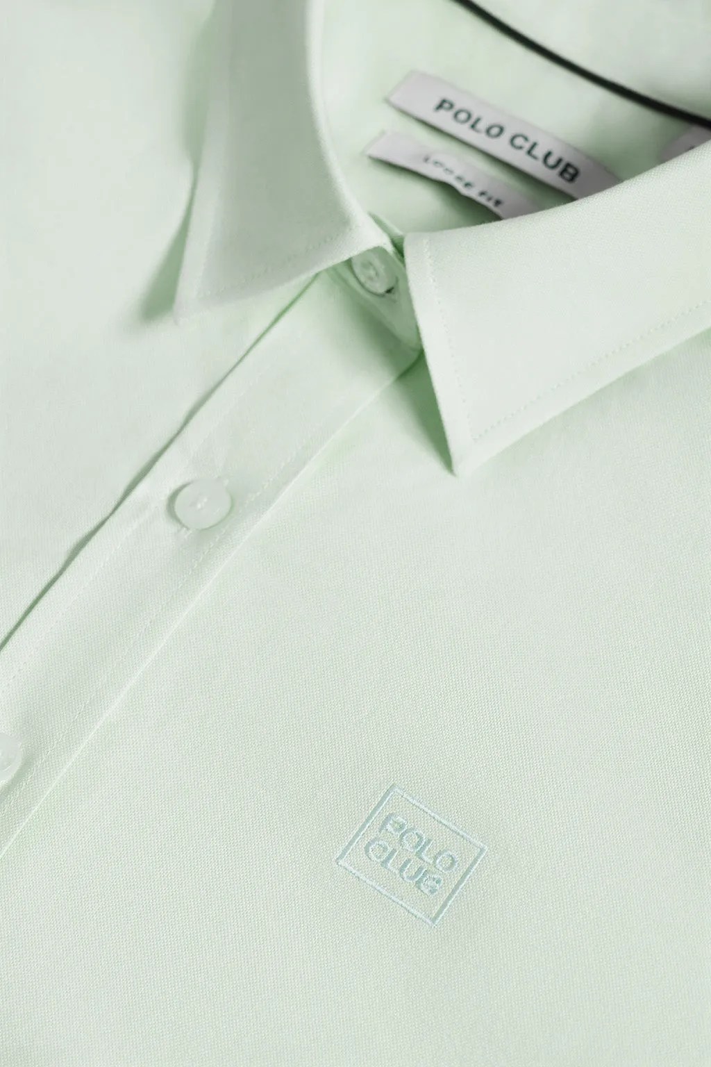 Camisa oxford verde claro con logo bordado