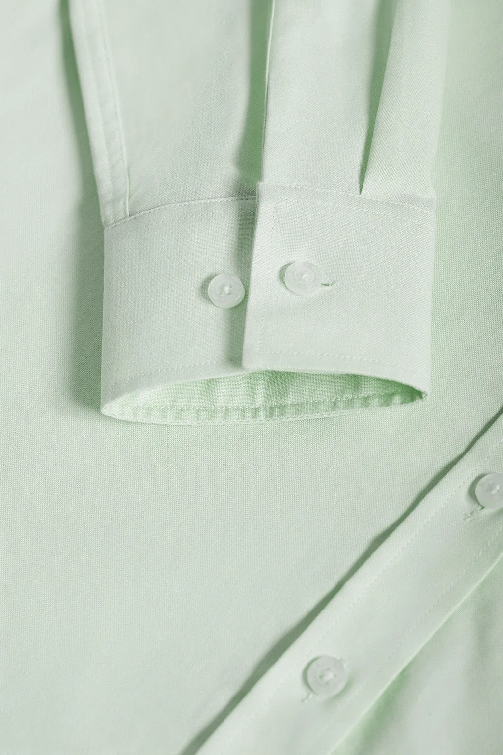 Camisa oxford verde claro con logo bordado