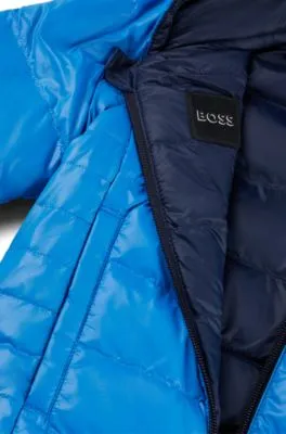 Chaqueta de plumón reversible para niños con detalles de logos