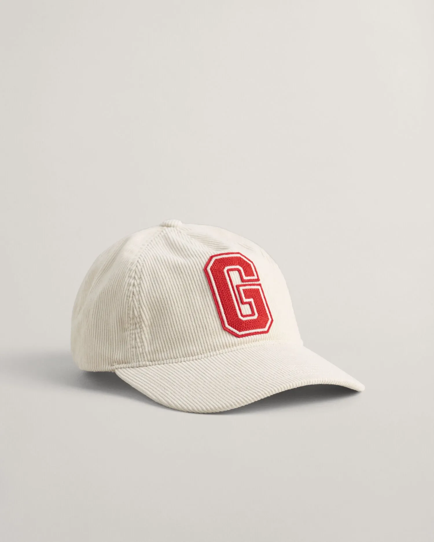 Gorra de pana con insignia G